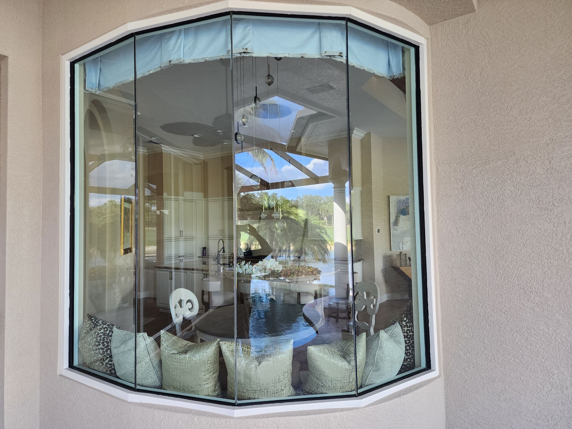 Home with a wall of impact-rated glass