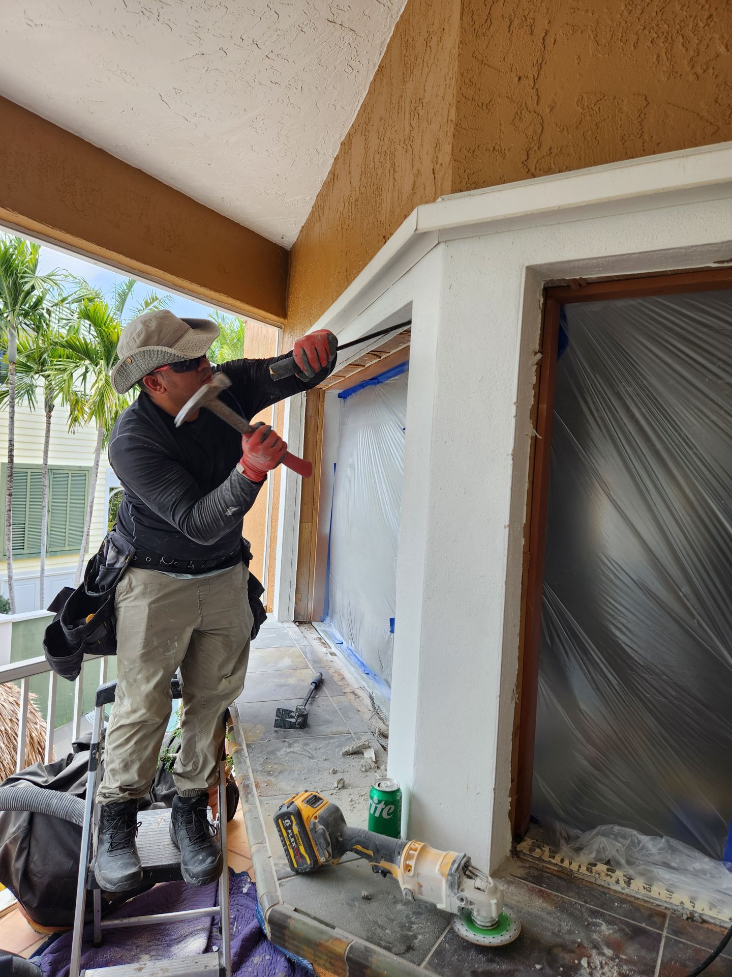 A&L installer setting a new impact door